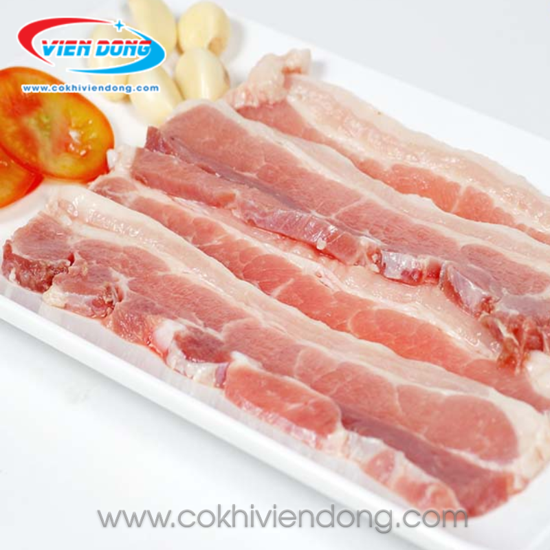 Máy cắt thịt heo